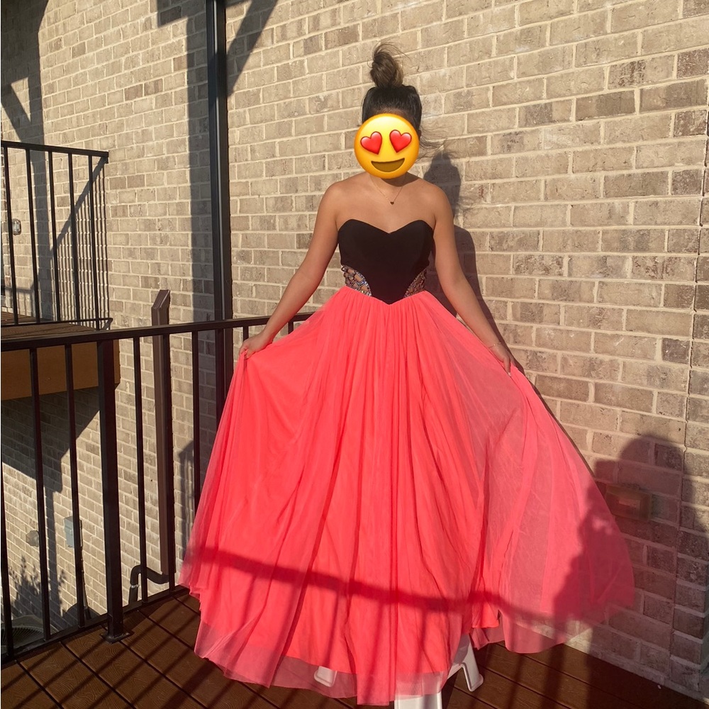 Beautiful sheer pink prom dress with bedazzled waist!